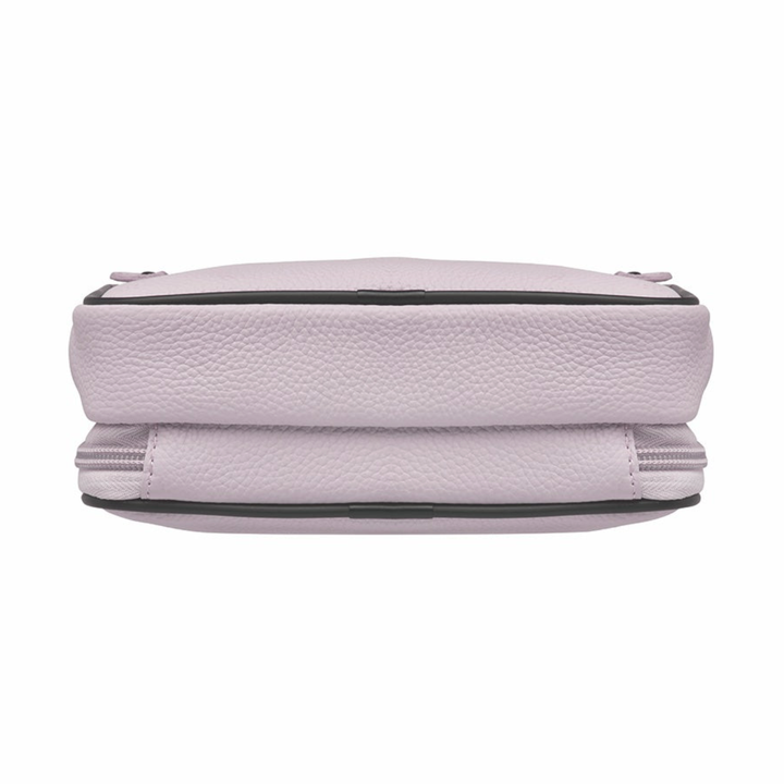 Lavender concealed carry sling waist pack made from soft pebbled American cowhide, with RFID zip pocket, crossbody or waist wear options, and discreet 3-sided access gun compartment with MINI holster compatibility.
