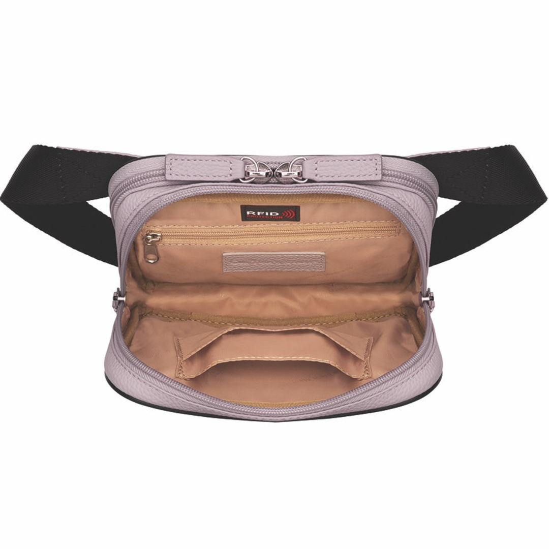 Lavender concealed carry sling waist pack made from soft pebbled American cowhide, with RFID zip pocket, crossbody or waist wear options, and discreet 3-sided access gun compartment with MINI holster compatibility.