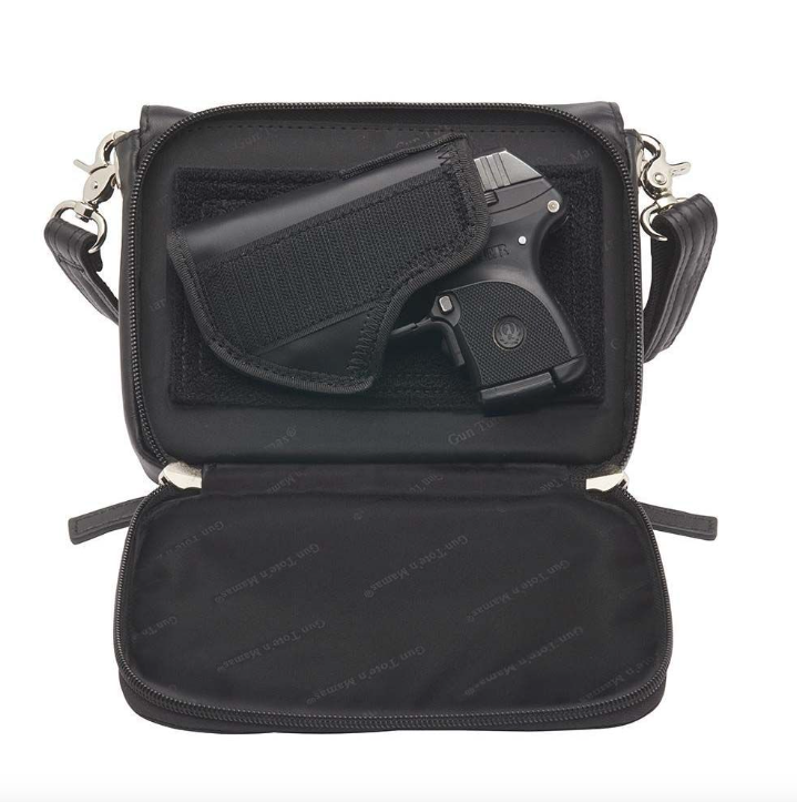 Black concealed carry bag in New Zealand lambskin – fits Springfield Hellcat, Ruger LCP, Glock 42, with RFID protection, mini Mernickle holster, magnetic flap closure, and slash-resistant crossbody strap