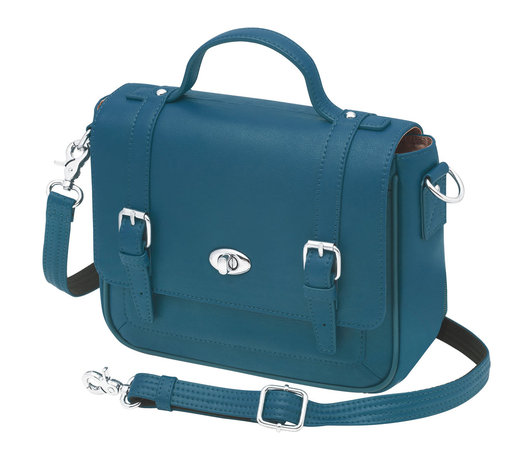 Ocean blue schoolgirl-style concealed carry crossbody satchel made from USA brushed cowhide, with RFID protection, toggle clasp flap closure, slash-resistant strap, and discreet side-access gun compartment