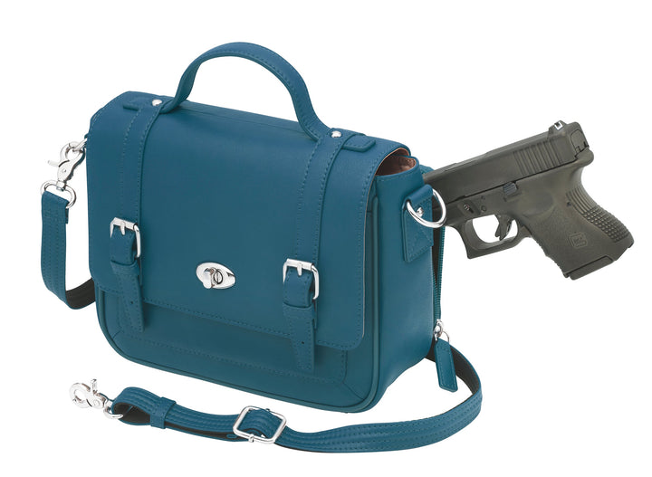 Ocean blue schoolgirl-style concealed carry crossbody satchel made from USA brushed cowhide, with RFID protection, toggle clasp flap closure, slash-resistant strap, and discreet side-access gun compartment