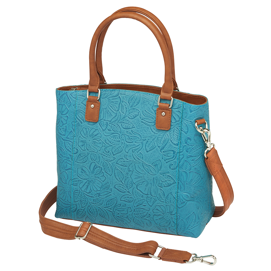 Teal and brown Town Tote concealed carry bag in tooled cowhide leather – spacious CCW compartment, durable design with adjustable shoulder strap, fits compact firearms, GTM-51
