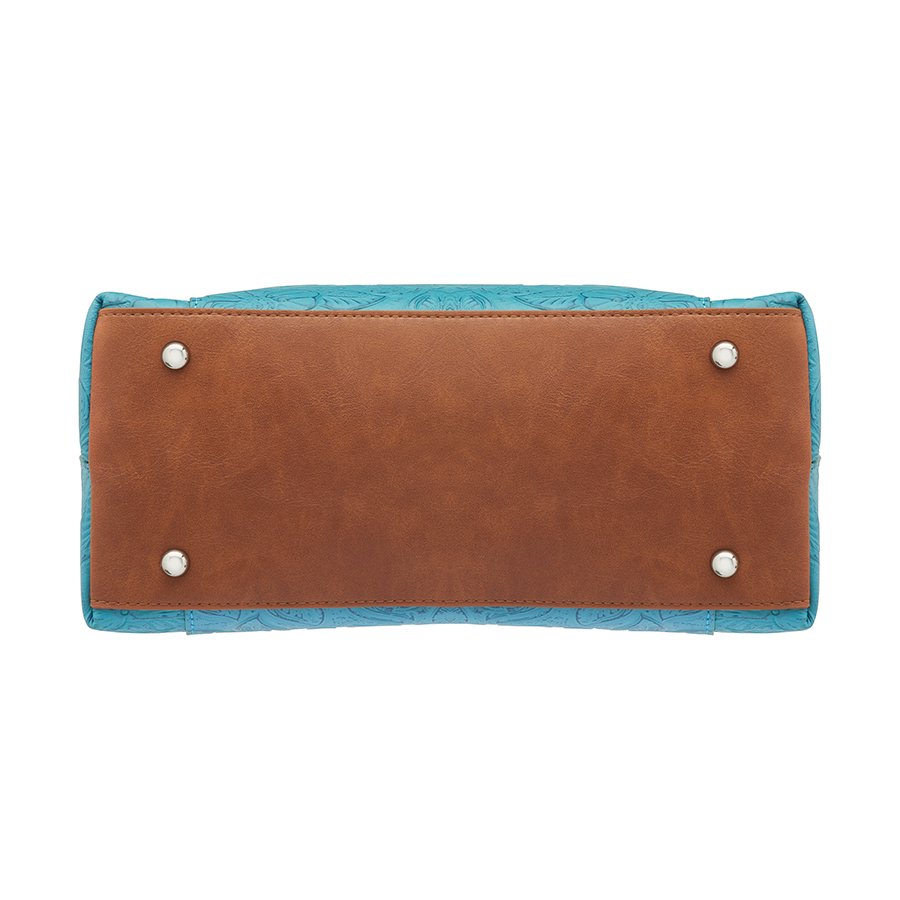 Teal and brown Town Tote concealed carry bag in tooled cowhide leather – spacious CCW compartment, durable design with adjustable shoulder strap, fits compact firearms, GTM-51