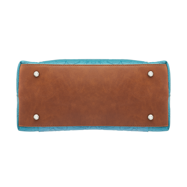 Teal and brown Town Tote concealed carry bag in tooled cowhide leather – spacious CCW compartment, durable design with adjustable shoulder strap, fits compact firearms, GTM-51