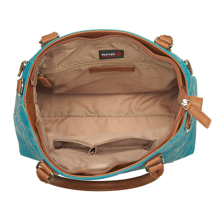 Teal and brown Town Tote concealed carry bag in tooled cowhide leather – spacious CCW compartment, durable design with adjustable shoulder strap, fits compact firearms, GTM-51