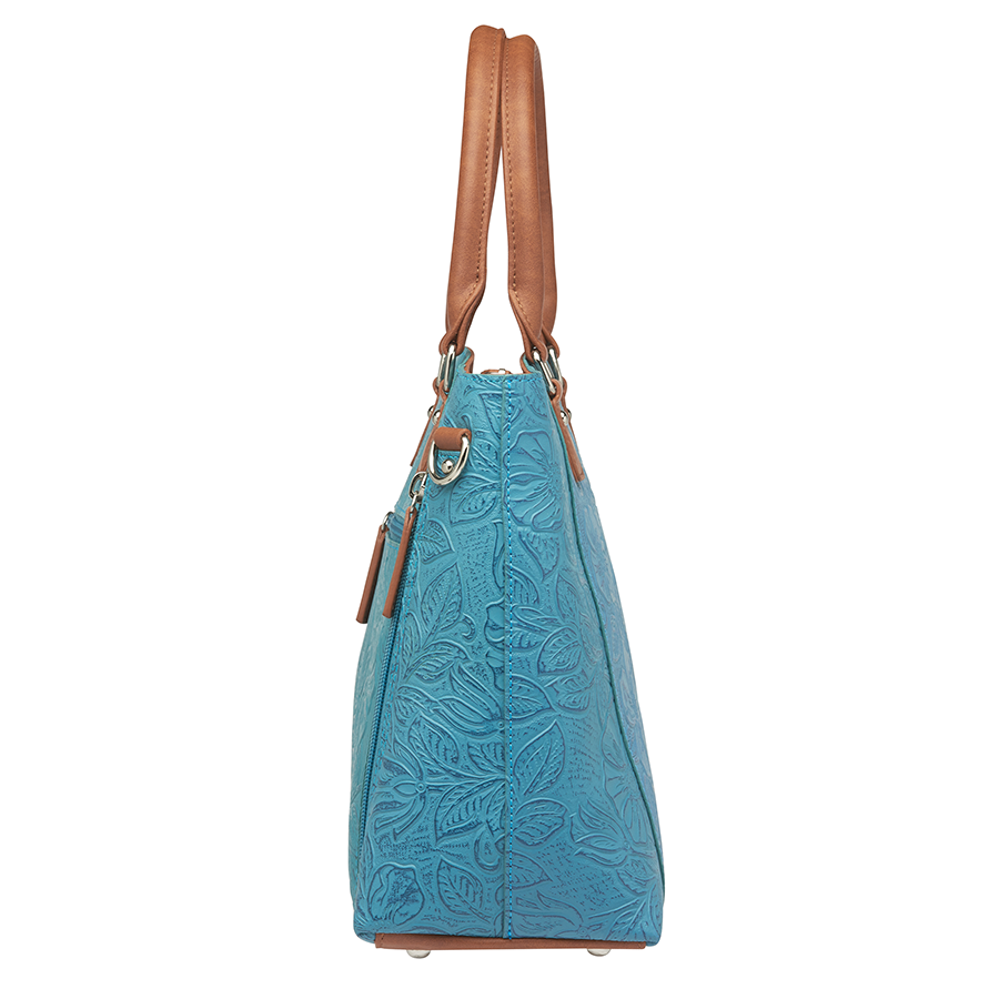 Teal and brown Town Tote concealed carry bag in tooled cowhide leather – spacious CCW compartment, durable design with adjustable shoulder strap, fits compact firearms, GTM-51