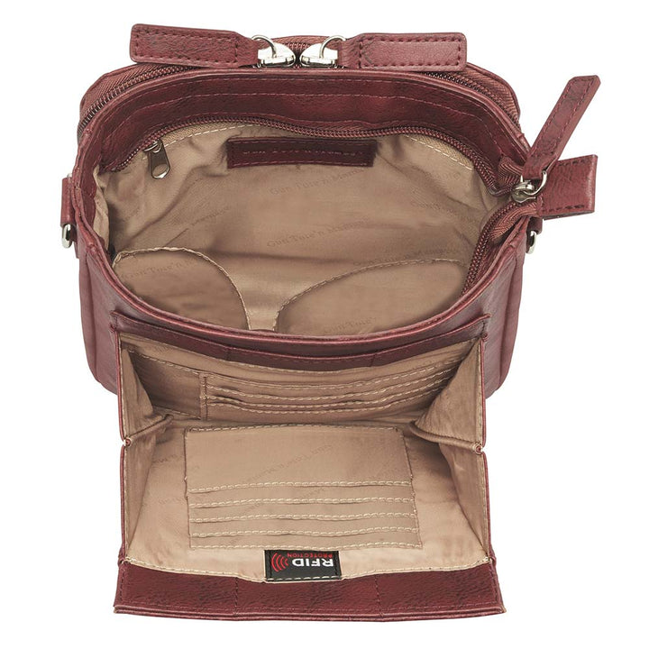 Red mini concealed carry crossbody bag with built-in RFID wallet, triple-sided zip gun access for small pistols, slash-resistant strap, zippered main compartment, washable cowhide leather with symbolic debossed pattern, ideal for women’s self-defense in a compact, stylish form.