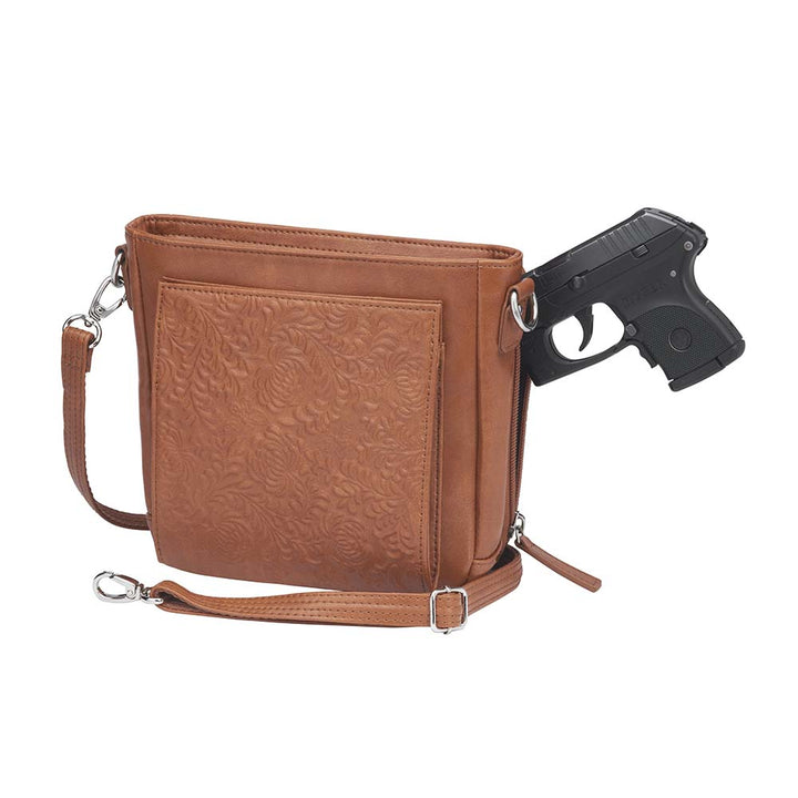 Tan concealed carry crossbody purse in washable American cowhide leather with RFID wallet organizer, slash-resistant steel cable strap, secure magnetic flap, triple-zippered gun access for compact firearms like Ruger LCP and Kahr 9, perfect for women seeking discreet protection and clean styling.
