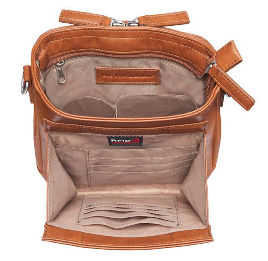 Tan concealed carry crossbody purse in washable American cowhide leather with RFID wallet organizer, slash-resistant steel cable strap, secure magnetic flap, triple-zippered gun access for compact firearms like Ruger LCP and Kahr 9, perfect for women seeking discreet protection and clean styling.