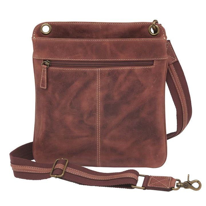 Vintage distressed buffalo leather concealed carry crossbody purse with adjustable slash-resistant strap, left and right-handed access, and a secure gun compartment designed for fast draw. Includes holster and fits compact handguns like S&W Shield, Ruger LCP, and Glock 42.