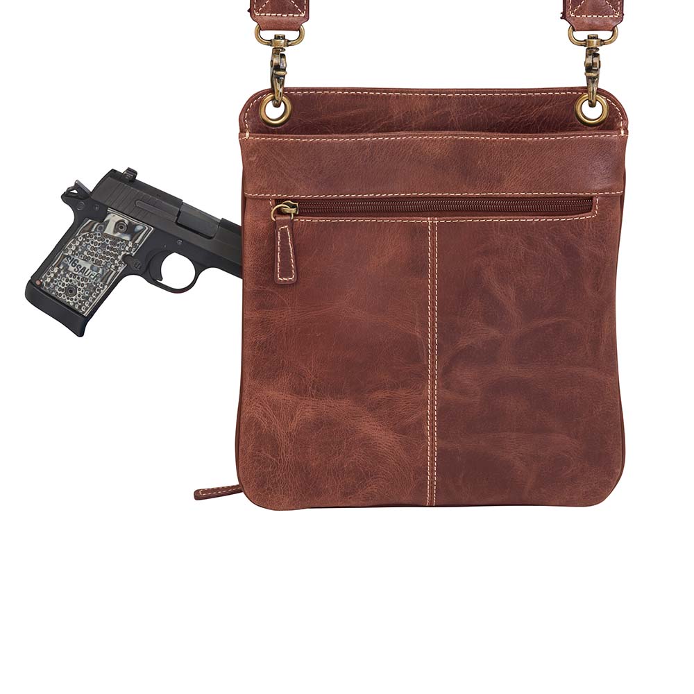 Vintage distressed buffalo leather concealed carry crossbody purse with adjustable slash-resistant strap, left and right-handed access, and a secure gun compartment designed for fast draw. Includes holster and fits compact handguns like S&W Shield, Ruger LCP, and Glock 42.