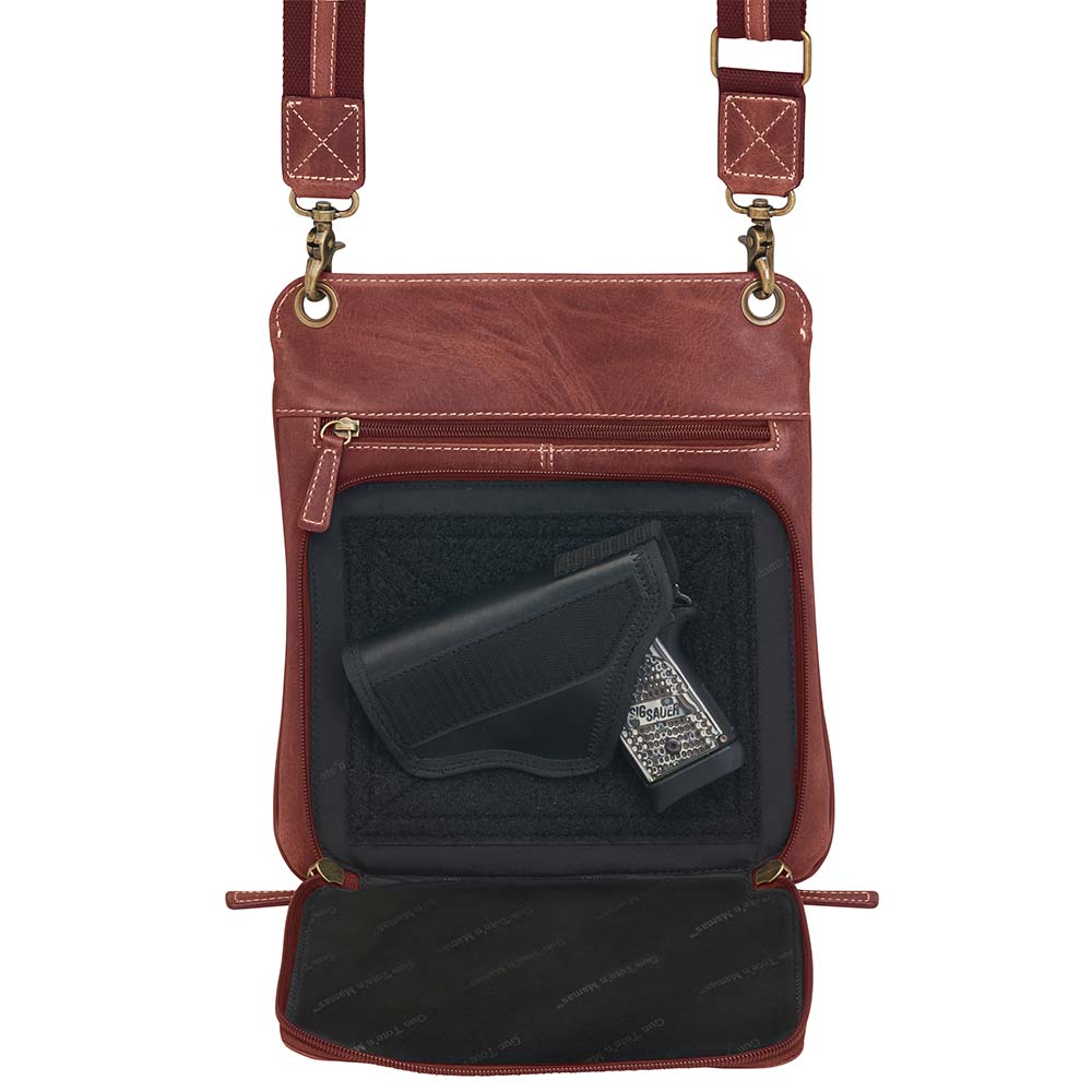 Vintage distressed buffalo leather concealed carry crossbody purse with adjustable slash-resistant strap, left and right-handed access, and a secure gun compartment designed for fast draw. Includes holster and fits compact handguns like S&W Shield, Ruger LCP, and Glock 42.