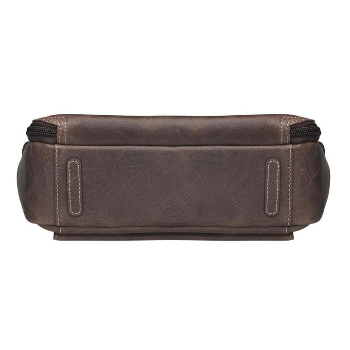 Slim crossbody concealed carry purse in distressed brown full-grain buffalo leather with RFID wallet organizer, top-draw gun compartment, fits Glock 19, Sig Sauer P320, or M&P Shield, slash-resistant strap.