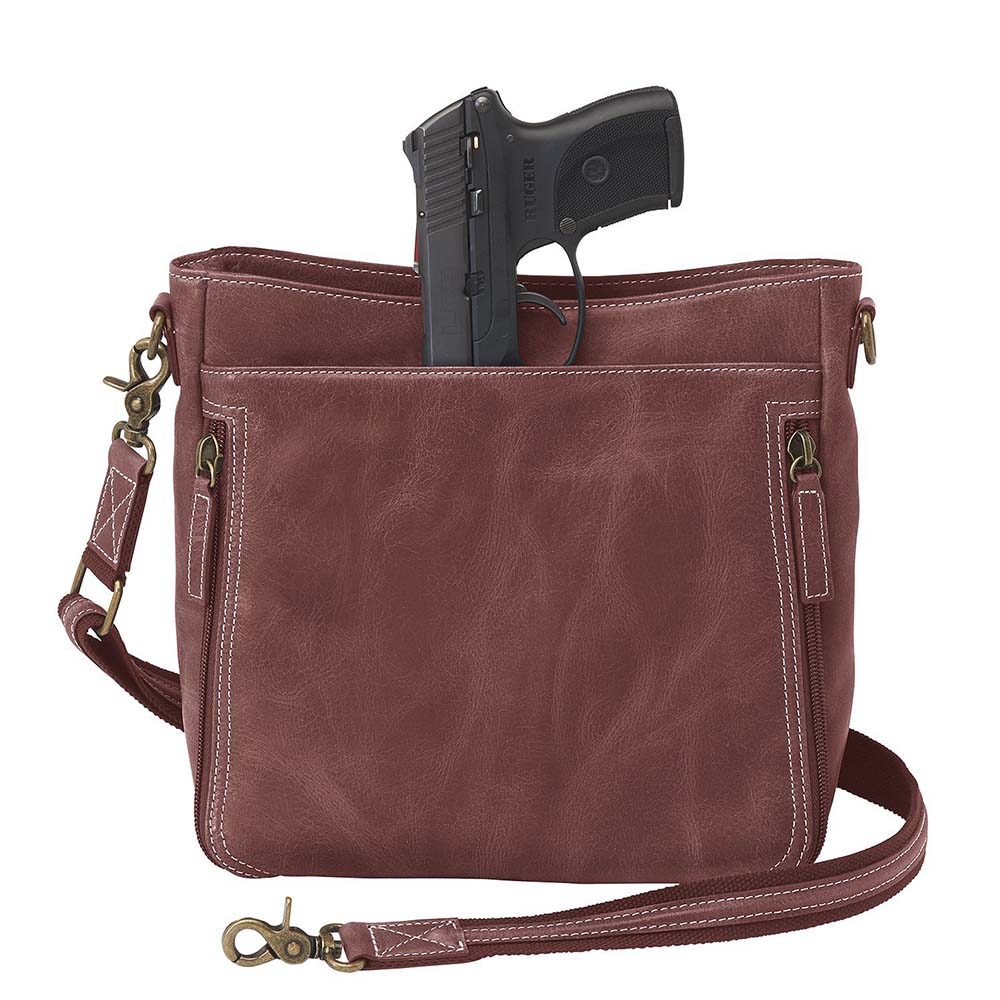 Red distressed leather concealed carry crossbody purse with RFID-secured card slots, top-draw access for right or left hand, fits compact pistols like Glock 26 or HK VP9, slash-resistant adjustable strap.