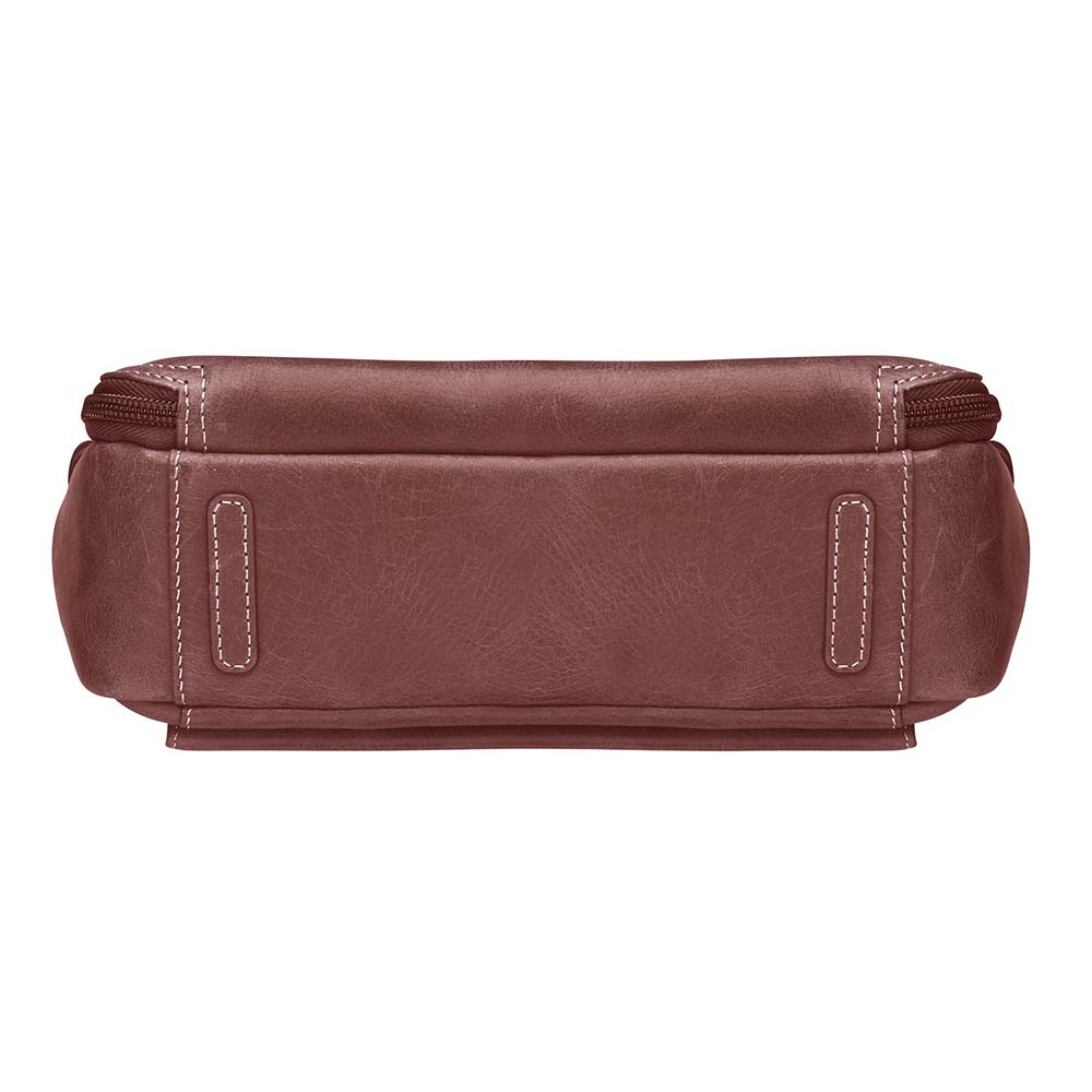 Red distressed leather crossbody shoulder bag by Gun Tote'N Mamas, designed for concealed carry with a slim profile.