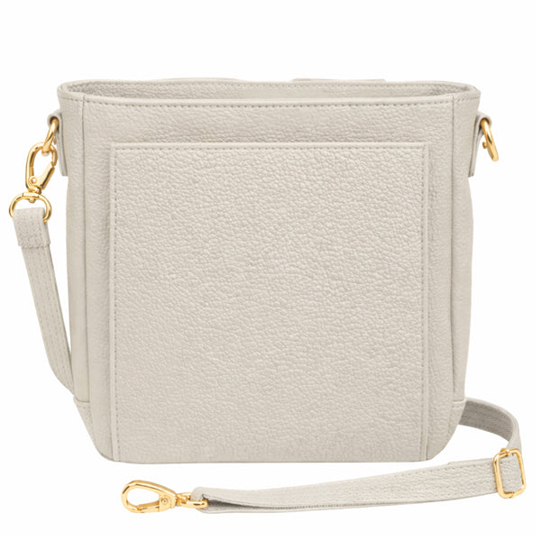 GTMoriginals Mini Slim Crossbody Concealed Carry Purse in brown sustainable cowhide, front view showing compact design and shoulder strap.