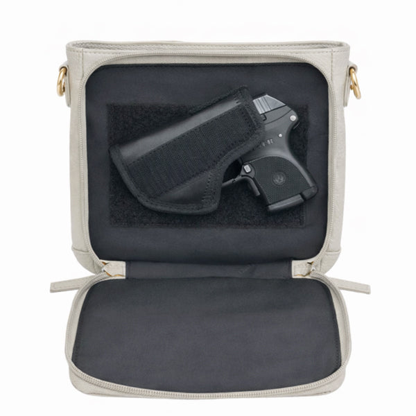GTMoriginals Mini Slim Crossbody Concealed Carry Purse in sustainable cowhide, open view showing interior compartments.