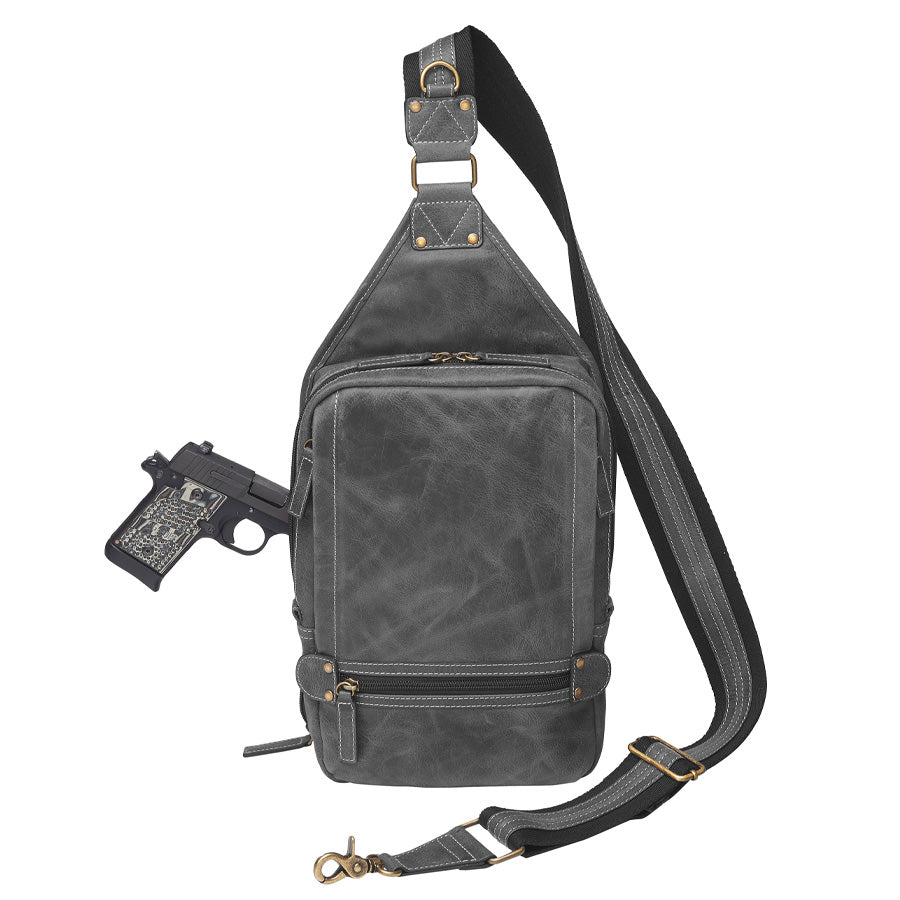 Distressed gray buffalo leather sling concealed carry backpack with tactical organization, RFID zip pocket, padded holster compartment for Glock 19, Sig P320, and HK VP9, slash-proof strap, and swing-front crossbody design with 3 exterior zip pockets and morale patch zone